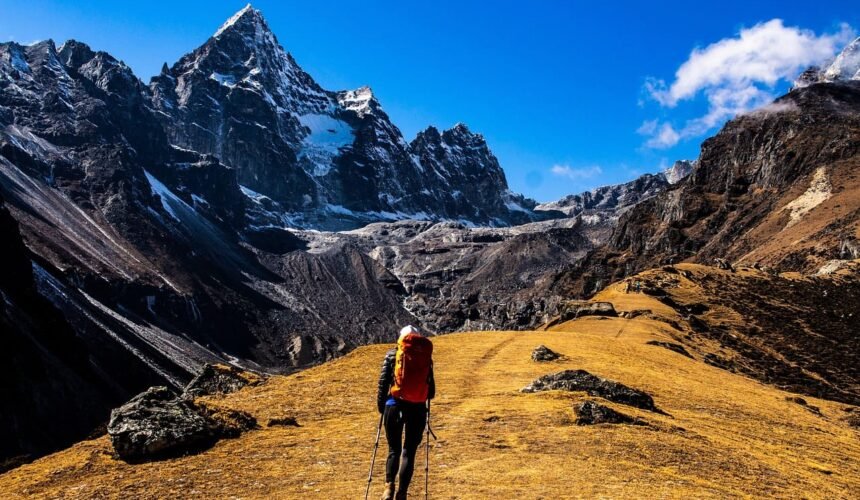 Trekking towards Mount Everest under crystal-clear autumn skies in Nepal.